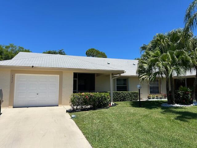 Discover the perfect blend of comfort and lifestyle in this 2/2 Villa with a one-car garage nestled in the highly sought after 55+ guard gated community of Cypress Lakes. Generous living space with an open floor plan, family room and screened patio. Enjoy resort-style amenities including an executive par-3 Golf Course FREE to owners, Pool, Hot Tub, Tennis, Pickleball courts, Bocce ball, Gym and a Miniature Golf course. Whether you're relaxing at home or joining community events, you'll love the active and social lifestyle this community offers. Kitchen has been remodeled and opened for a great room effect. Newly installed Tile floors throughout. Accordion shutters installed in 2018 on all windows. Patio has roll down storm shutters. Driveway widened to accommodate two vehicles.