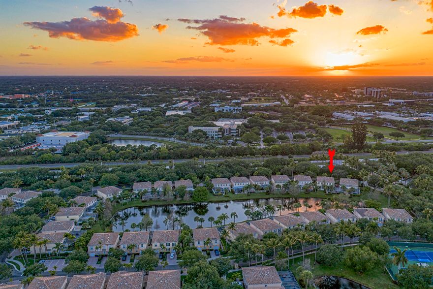 This comfortable residence is perfectly located in the heart of Palm Beach Gardens, within the highly sought-after Catalina Lakes, a DiVosta Signature community—offering an excellent opportunity to own your new home. This beautifully updated townhouse features 3 bedrooms, 2.5 bathrooms, and a 1-car garage. Enjoy a private patio with tranquil lake views, and take in the same peaceful scenery from the spacious primary bedroom. The home includes a brand-new roof (2025) and a brand-new A/C unit (2026), providing peace of mind and modern comfort. It also features a screened-in courtyard patio, ideal for relaxing or entertaining. Residents enjoy access to a heated pool, four scenic lakes, tennis courts, a pickleball court, and a children's playground. Ideally located just minutes from  The Gardens , Mall fine dining, championship golf courses, and the pristine beaches of Juno and Jupiter. The garage is equipped with an EV charger.The large screened-in courtyard patio has a beautiful lake views, creating the perfect space to relax or entertain. The expansive primary bedroom offers two generous closets and a spacious en-suite bath with dual sinks, a soaking tub, and a separate shower. The staircase has tile floors. The living area and bedrooms has 4 ceiling fans in total . Take a look at this residency!