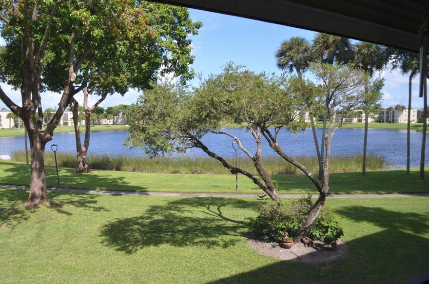 55+ Condo....Come n enjoy your gorgeous lake views while sipping your morning coffee on your screened balcony. This Deluxe model unit in wonderful Las Verdes features tile throughout w/ nice laminate flooring on the Master Bedroom. Fresh clean tile backsplash highlights the older updated kitchen w/ new stove. Whole unit just freshly painted. New fan on balcony w/ large storage closet. Laundry just steps away from your front door. NO PETS, 55+ CONDO ASSOC. Tons of amenities to enjoy including 3 pools, Pickleball & Tennis Courts, Hot Tubs, Game Room, New Gym in Clubhouse, Active Clubhouse with weekly exercise n yoga classes. Gated safe ciommunity across the street from Delray Medical Center.
