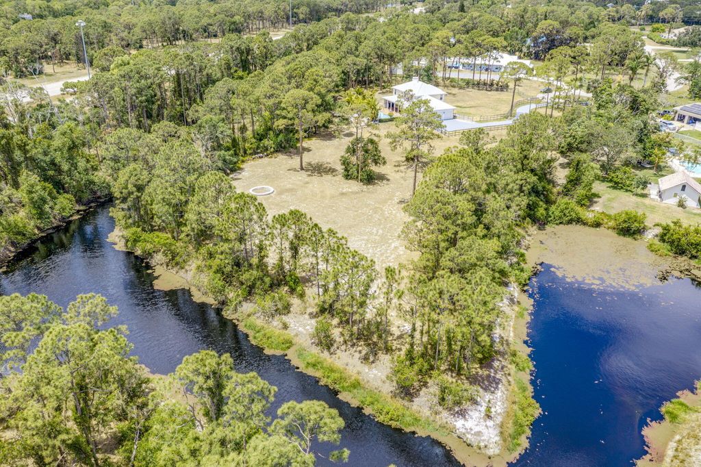 Photo of 3202 SW Holly Lane, Palm City, FL 34990 (MLS # R11162755)