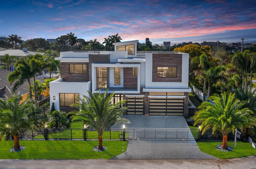 Just Completed! Stunning deep-water new construction estate located in the Golden Triangle! A ''best of everything'' lifestyle home.