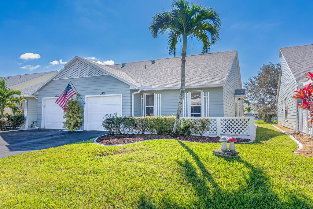 Photo of 2530 SE Tropical East Cir, Port Saint Lucie, FL 34952 (MLS # R10957106)