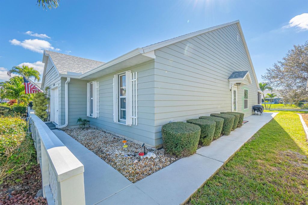 Photo of 2530 SE Tropical East Cir, Port Saint Lucie, FL 34952 (MLS # R10957106)