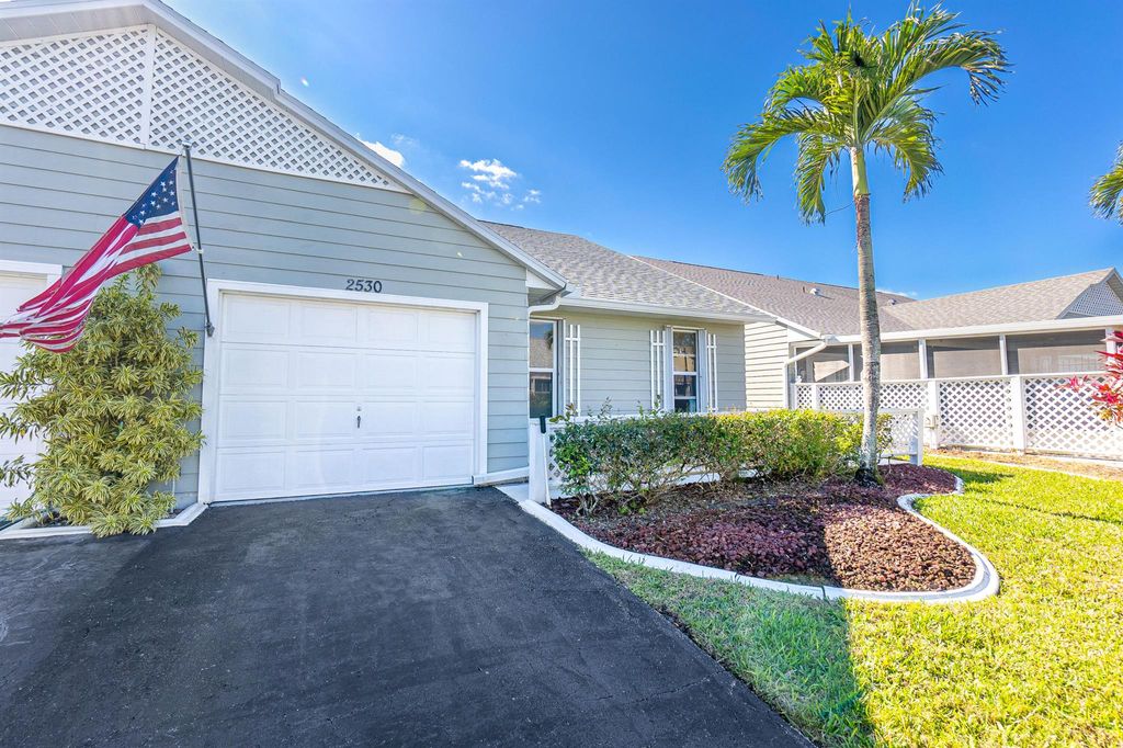 Photo of 2530 SE Tropical East Cir, Port Saint Lucie, FL 34952 (MLS # R10957106)