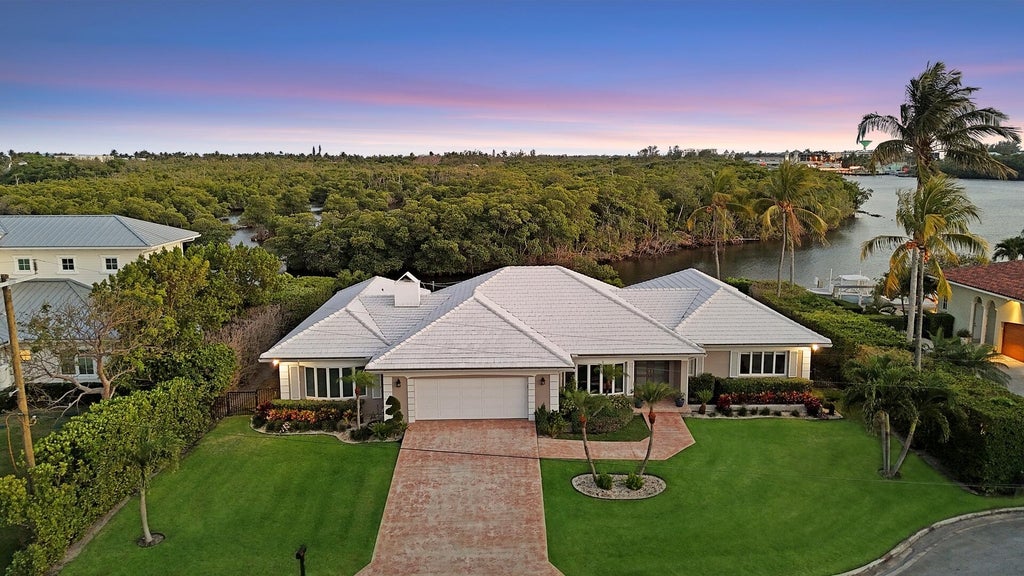 Photo of 7 Inlet Cay Drive, Ocean Ridge, FL 33435 (MLS # R11136616)
