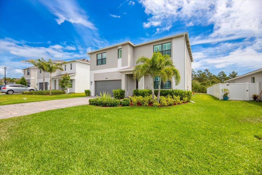 Photo of 1809 NE Ocean Dunes Drive, Jensen Beach, FL 34957 (MLS # R11087068)
