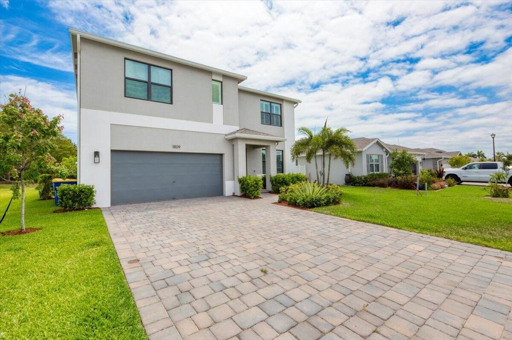 Photo of 1809 NE Ocean Dunes Drive, Jensen Beach, FL 34957 (MLS # R11087068)