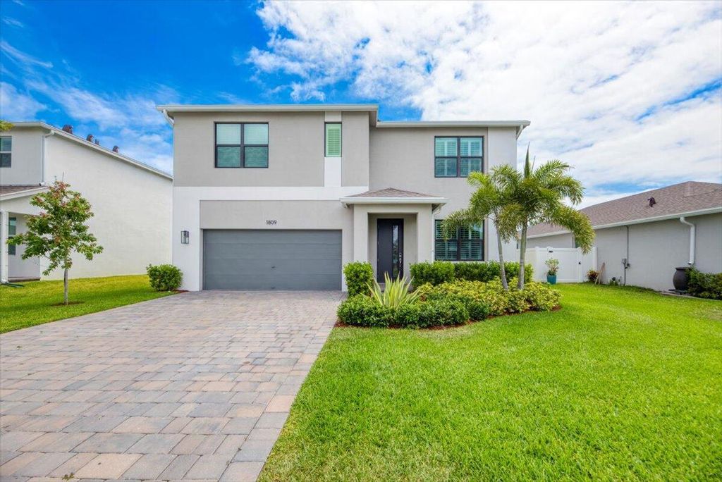 Photo of 1809 NE Ocean Dunes Drive, Jensen Beach, FL 34957 (MLS # R11087068)