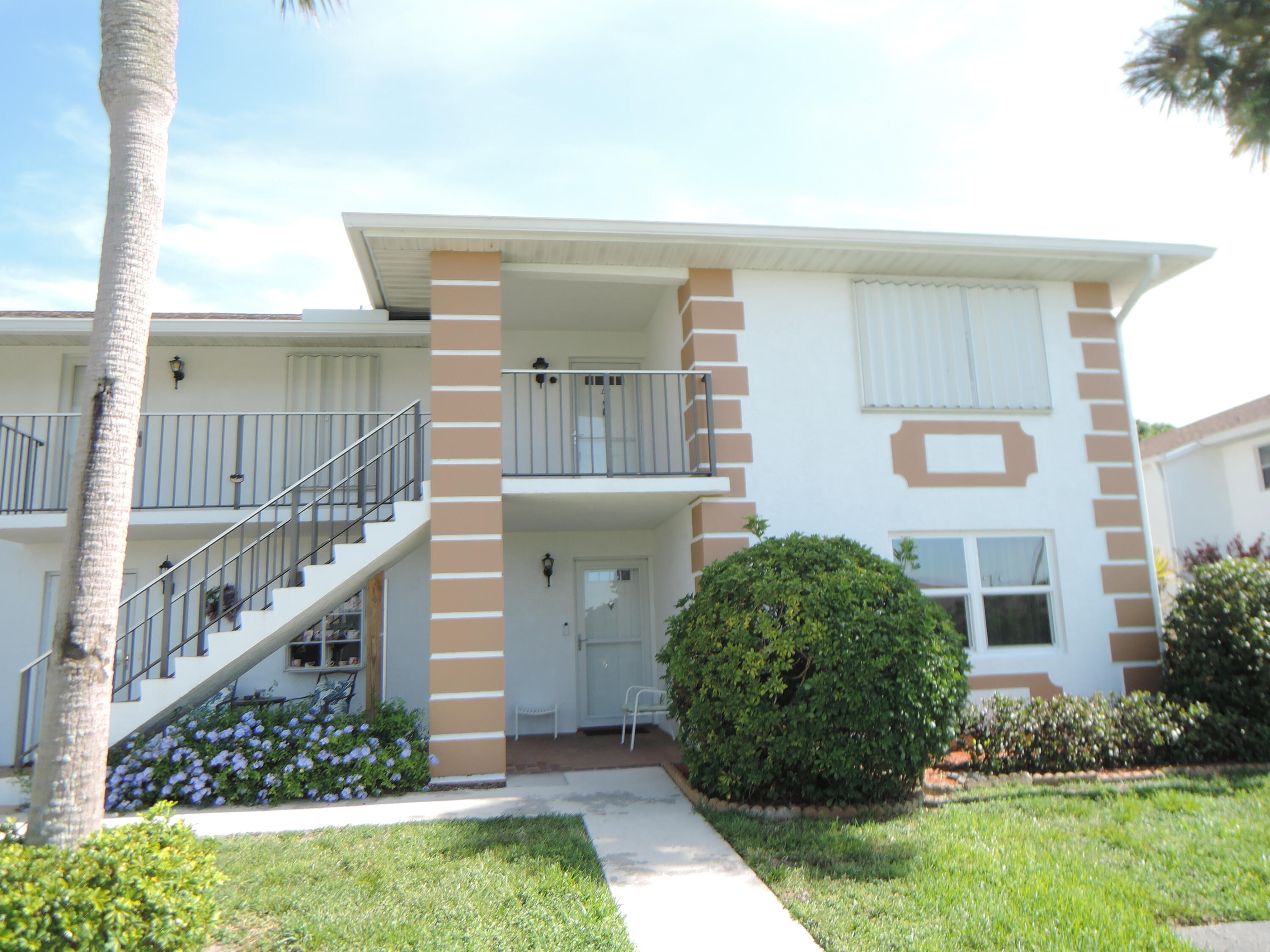 ***MUST BE 55 YEARS + & HAVE A CREDIT SCORE OF 700+ TO LIVE IN HIGH POINT OF FT PIERCE*** Nicely furnished & updated 2nd floor 2/2 end condo with spacious floor plan. Split bedrooms w/master to the back of unit. FL RM has the accordion shutter on it presently as all windows are shuttered for owner's storm protection. Will have the shutters opened at time of lease. Owner requires an annual lease since association requires only one time per year rentals. Monthly rental amount includes water, sewer, trash pick-up, Cable TV, Internet, 24-hour manned gate, lawn care, + amenities, POOL, club house w/pool table & other activities. A tennis court, & shuffleboard for all to enjoy. Unit is available for occupancy after association receives their background, credit reports & tenant interview.