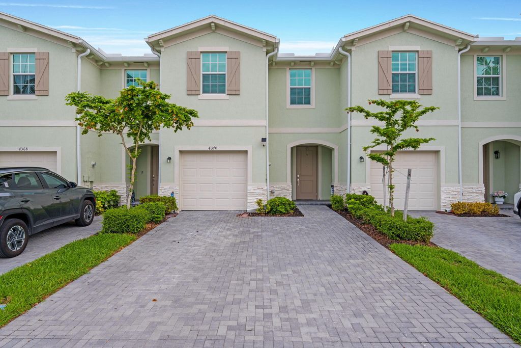 Photo of 4370 Pond Lily Lane, Lake Worth, FL 33467 (MLS # B26008398)