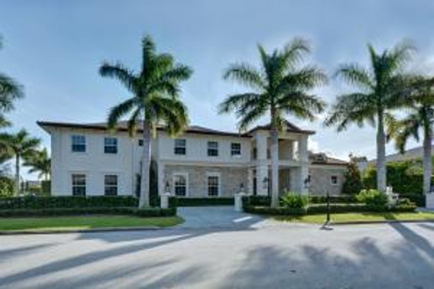 Stunning interior home on a corner lot in Royal Palm Yacht & Country Club with southern exposure, 5 bedrooms, 6 full and 2 half bathrooms, 6244sqft under air and a 3 car garage plus golf cart. Professionally decorated with comfortable elegance, this home showcases many splendid details and is perfect for family gatherings, entertaining and relaxation. From the moment you enter the front door you are captivated and welcomed with the beautiful marble foyer and wooden staircase. To the right is a clubroom/media room with lots of natural light, a bar and French doors leading to a covered patio. To the left is an elevator with glass door, private dining room, large kitchen/family room opening to the pool/patio area, den/office, wine room and laundry room with two washers and two dryers.