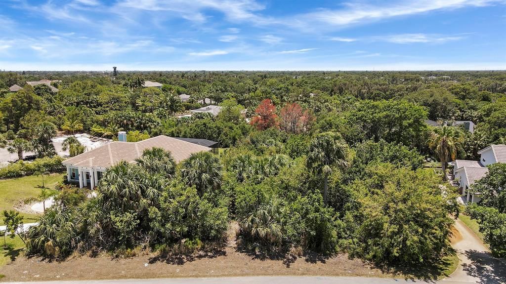 Photo of 3850 NE Sugarhill Avenue, Jensen Beach, FL 34957 (MLS # R10734179)