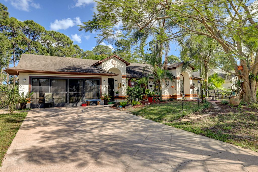 Photo of 2997 SW Collings Drive, Port Saint Lucie, FL 34953 (MLS # R10781335)