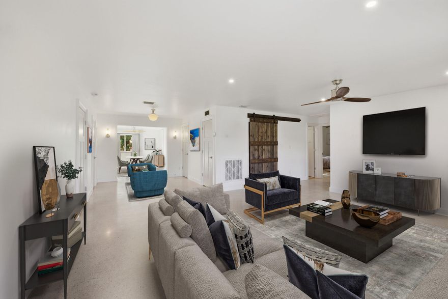 Beautiful 3 bed, 2.5 bath home located in the highly desirable Edgewood neighborhood of Fort Lauderdale. This well-maintained residence features impact windows, classic terrazzo floors, and a spacious, functional floor plan perfect for both everyday living and entertaining. The open kitchen flows seamlessly into the main living areas & is complemented by tastefully renovated bathrooms. Enjoy a large private backyard with plenty of room to create your dream outdoor space, add a pool, or entertain guests year-round. Ideally situated just minutes from Fort Lauderdale-Hollywood International Airport, Port Everglades, Downtown Fort Lauderdale, major highways, shopping, dining, and the beaches. A fantastic opportunity to own in one of Fort Lauderdale's most convenient and growing areas!