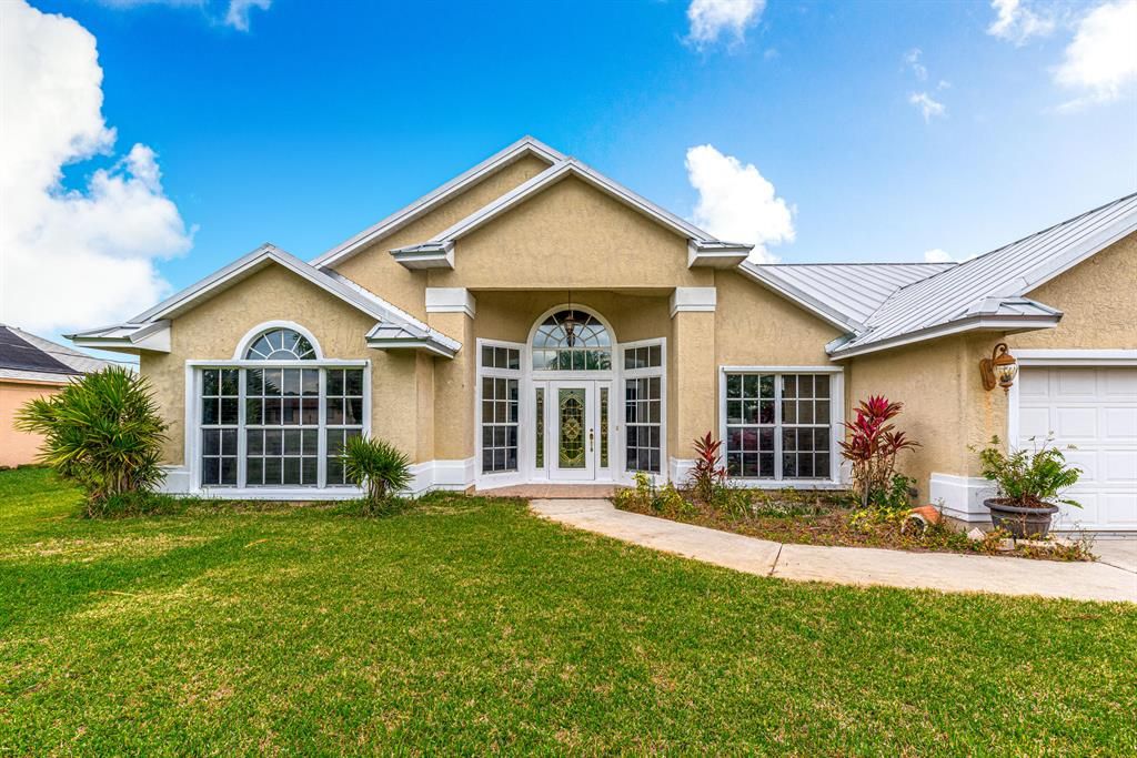 Photo of 799 SE Albatross Avenue, Port Saint Lucie, FL 34983 (MLS # R10697290)