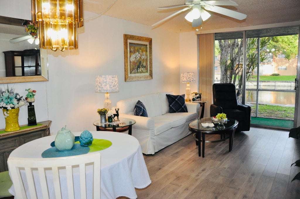 Photo of 9070 Lime Bay Boulevard #103, Tamarac, FL 33321 (MLS # B26085496)