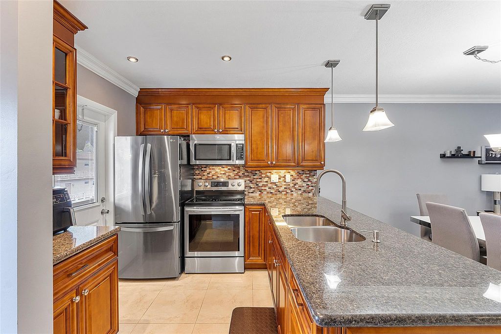 Photo of 5051 W Oakland Park Boulevard #301, Lauderdale Lakes, FL 33313 (MLS # F10512078)