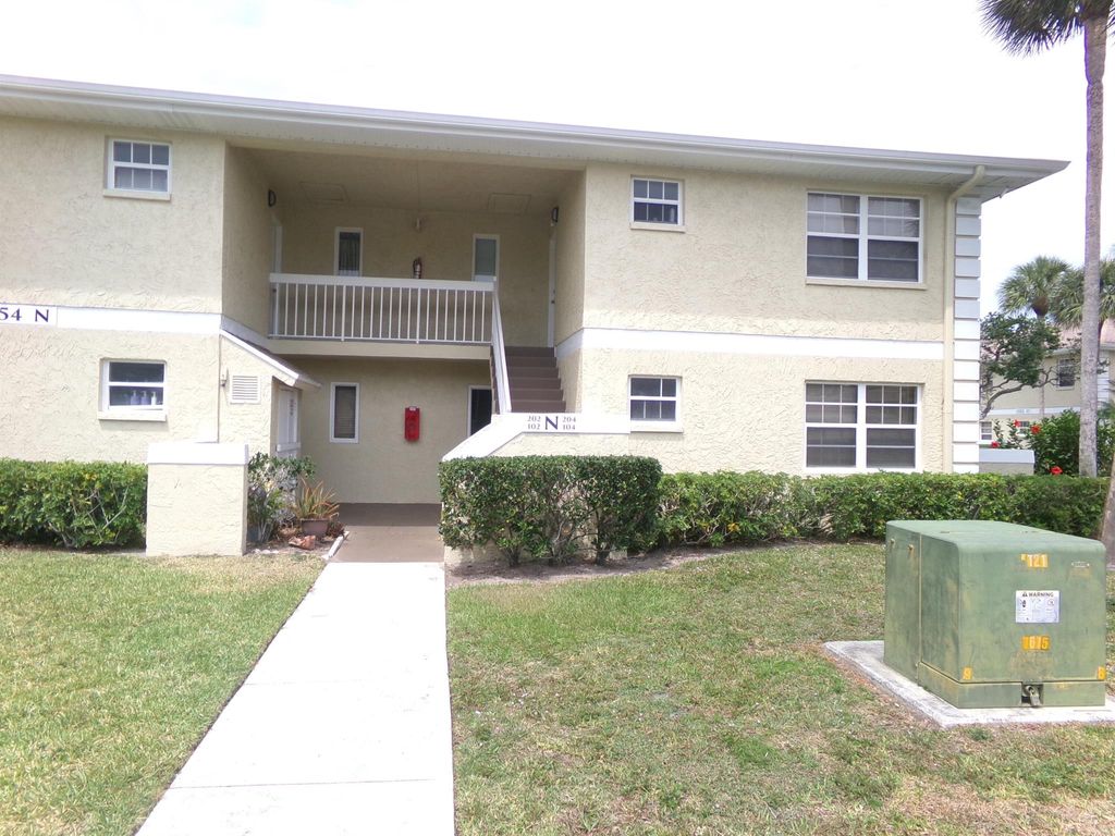 Photo of 1554 SE Royal Green Circle #N 104, Port Saint Lucie, FL 34952 (MLS # R11084006)