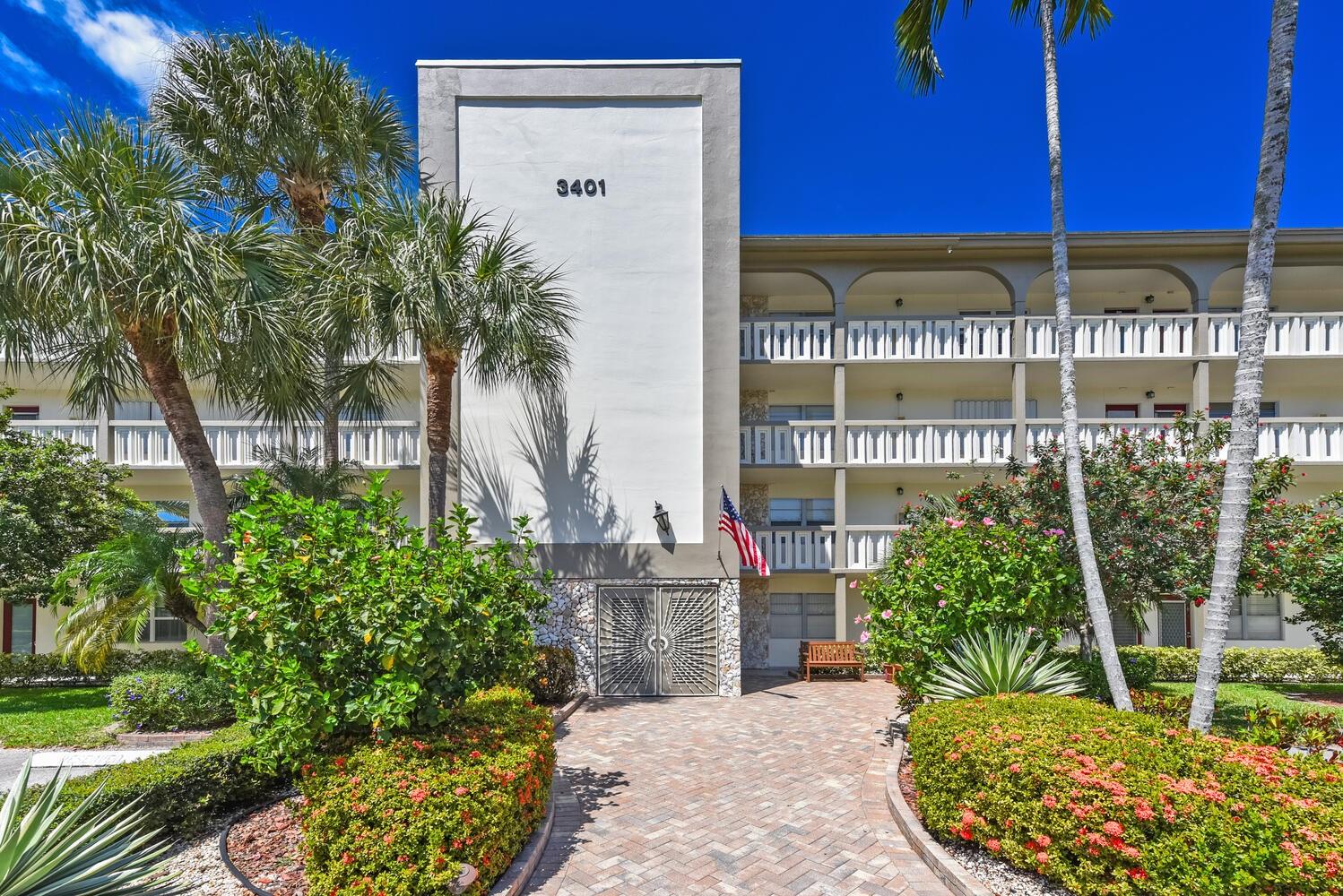 Price Just Reduced - Motivated Seller - 55+Community - Beautifully updated unit with Custom Superior kitchen cabinetry including a wine rack and glass doors. Granite countertops with an extra wide kitchen pass through. Large diagonal flooring tile throughout. Patio has a large archway from the living room that's enclosed with sliding hurricane glass door which provides an amazing cross breeze weather permitting. Many nice touches, such as, crown molding, chair rails and textured walls. Superior cabinetry in baths as well. Full Size stackable washer/dryer in the unit. There is a golf view and steps away from the pool. Really is a must see.