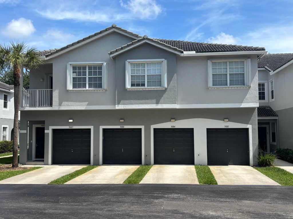 Photo of 3080 Grandiflora Drive, Greenacres, FL 33467 (MLS # B26025212)