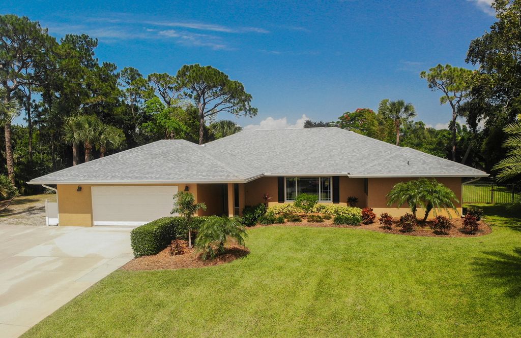 Photo of 2149 SE Bersell Road Rd, Port St Lucie, FL 34952 (MLS # R10803753)