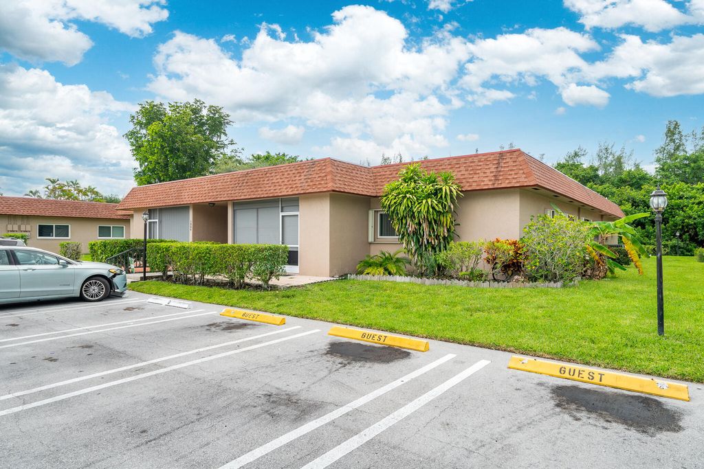 Photo of 1904 Palmland Drive, Boynton Beach, FL 33436 (MLS # B26024644)