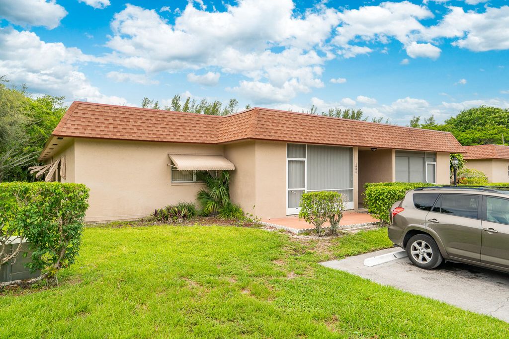 Photo of 1904 Palmland Drive, Boynton Beach, FL 33436 (MLS # B26024644)