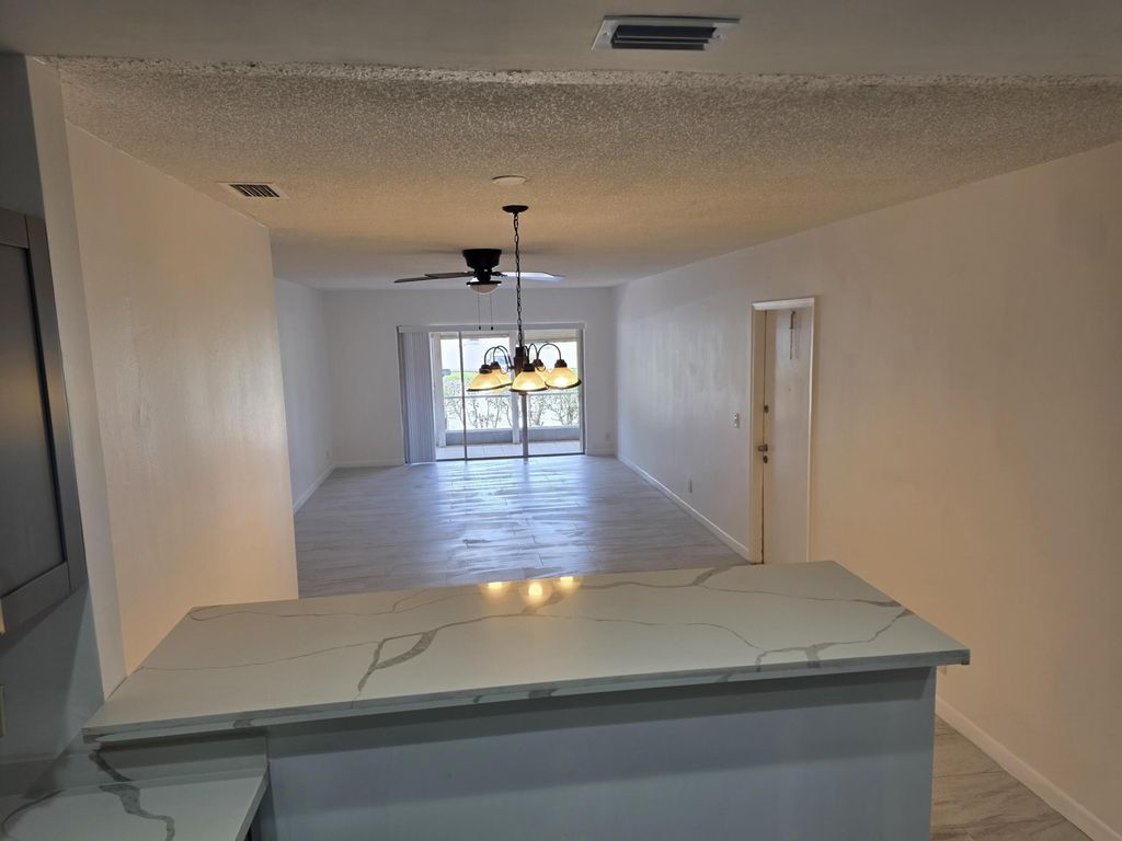 Photo of 1904 Palmland Drive, Boynton Beach, FL 33436 (MLS # B26024644)