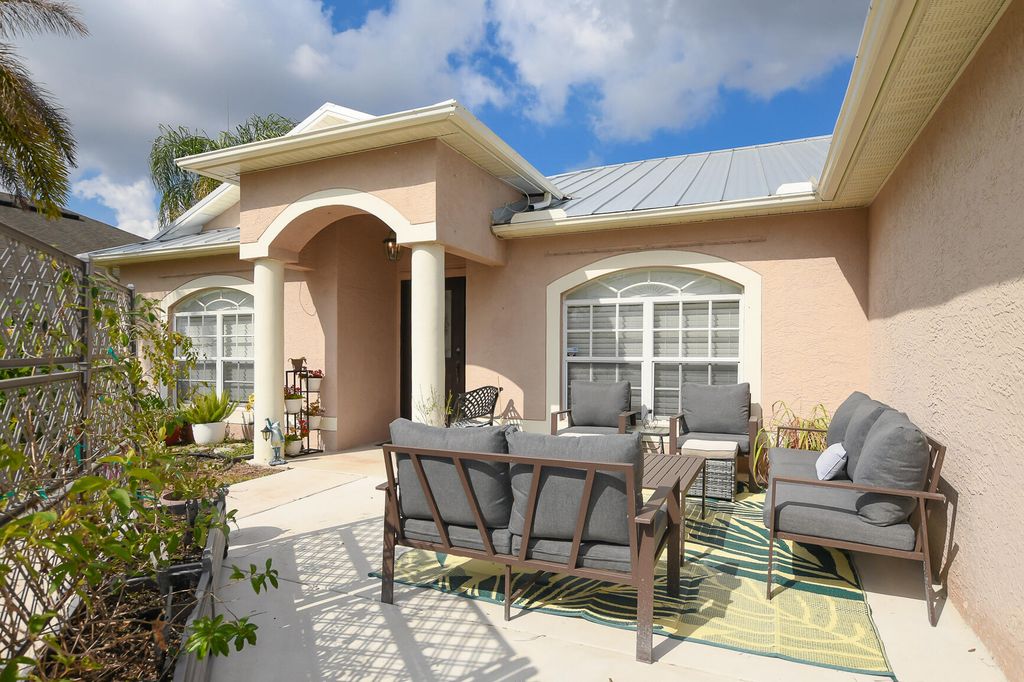 Photo of 1662 SW Rutland Street, Port Saint Lucie, FL 34987 (MLS # B26007949)