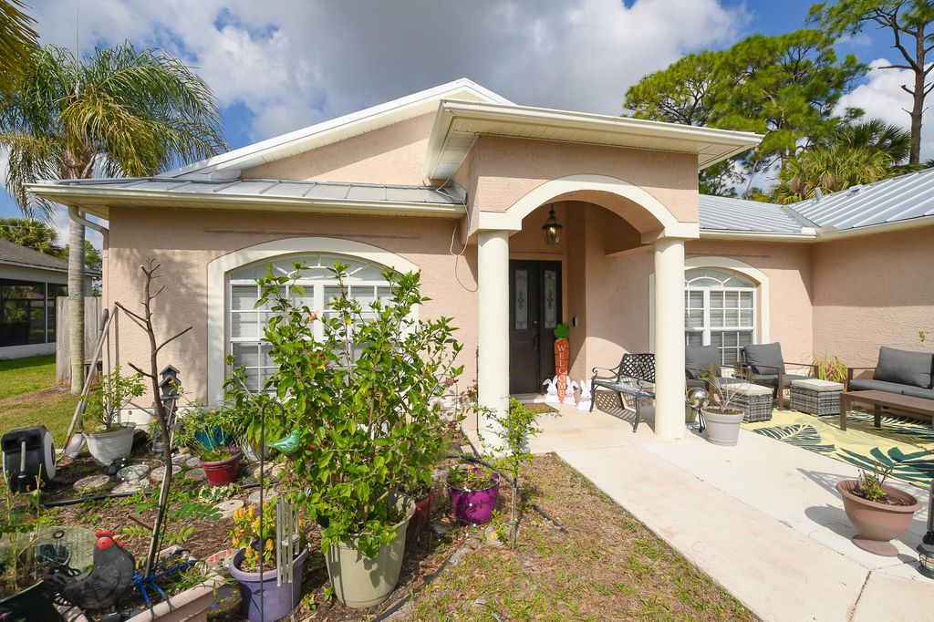 Photo of 1662 SW Rutland Street, Port Saint Lucie, FL 34987 (MLS # B26007949)