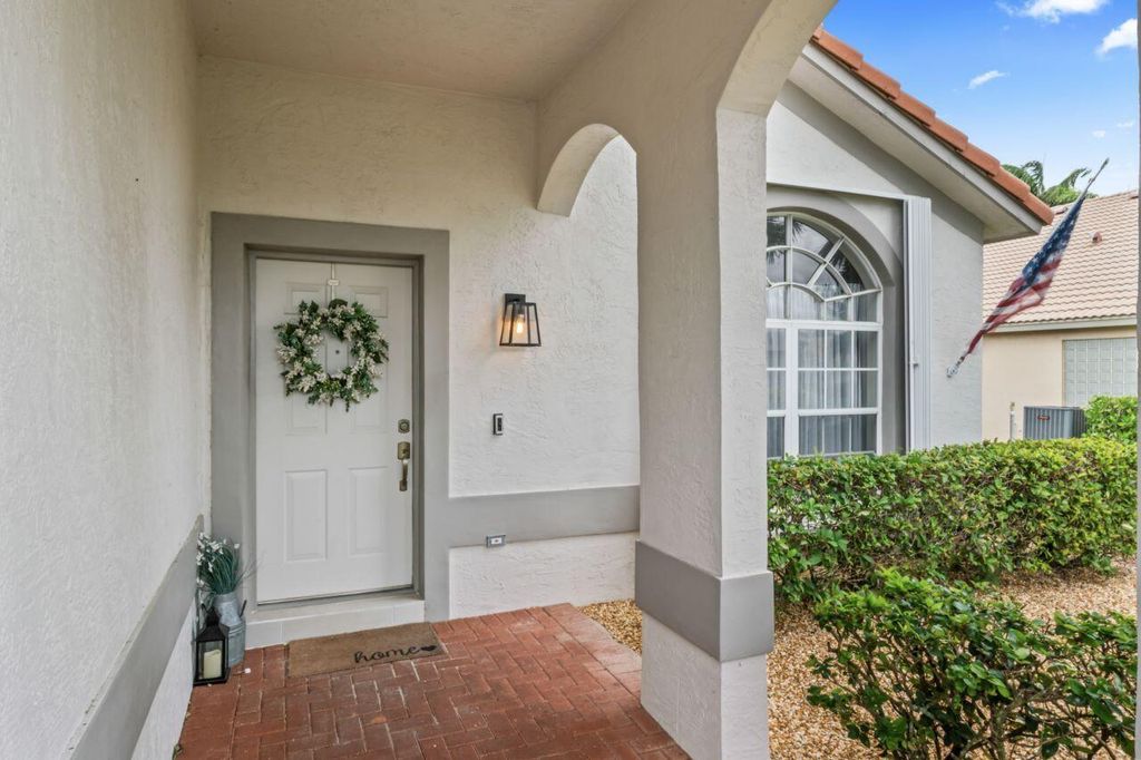 Photo of 2538 Egret Lake Drive, Greenacres, FL 33413 (MLS # B26025236)