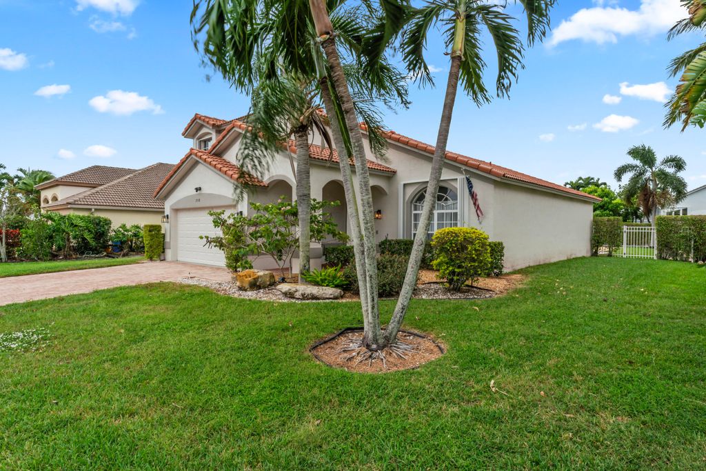 Photo of 2538 Egret Lake Drive, Greenacres, FL 33413 (MLS # B26025236)