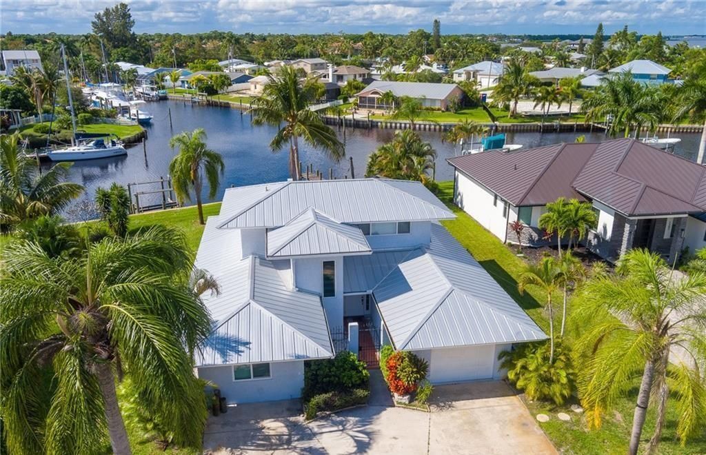 Photo of 1597 SW Egret Way, Palm City, FL 34990 (MLS # R11057375)