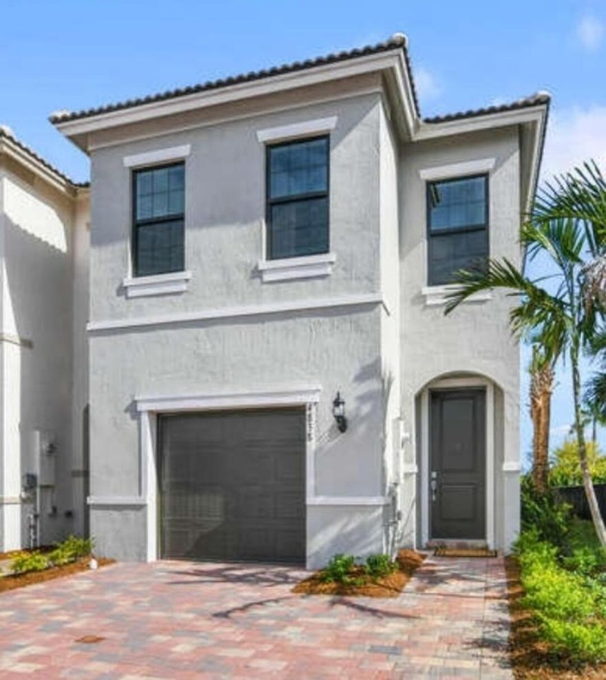 Beautiful end unit in prestigious The Fields at Polo community with 2 clubhouses, gym, tennis, playgrounds and so much more. A+ rated schools. Extra long driveway and oversized bedrooms each with walk-in closet .
