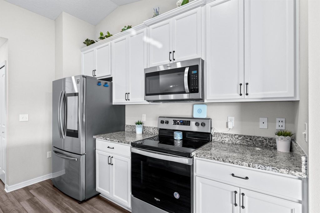 Photo of 1018 SW Dartmouth Avenue, Port Saint Lucie, FL 34953 (MLS # R11034134)