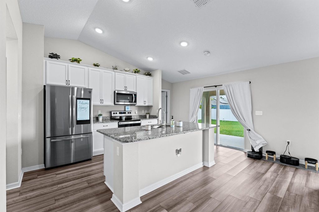 Photo of 1018 SW Dartmouth Avenue, Port Saint Lucie, FL 34953 (MLS # R11034134)