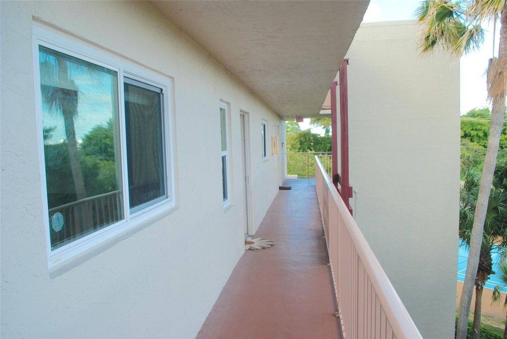 Photo of 2104 S Cypress Bend Drive #408, Pompano Beach, FL 33069 (MLS # F10449613)