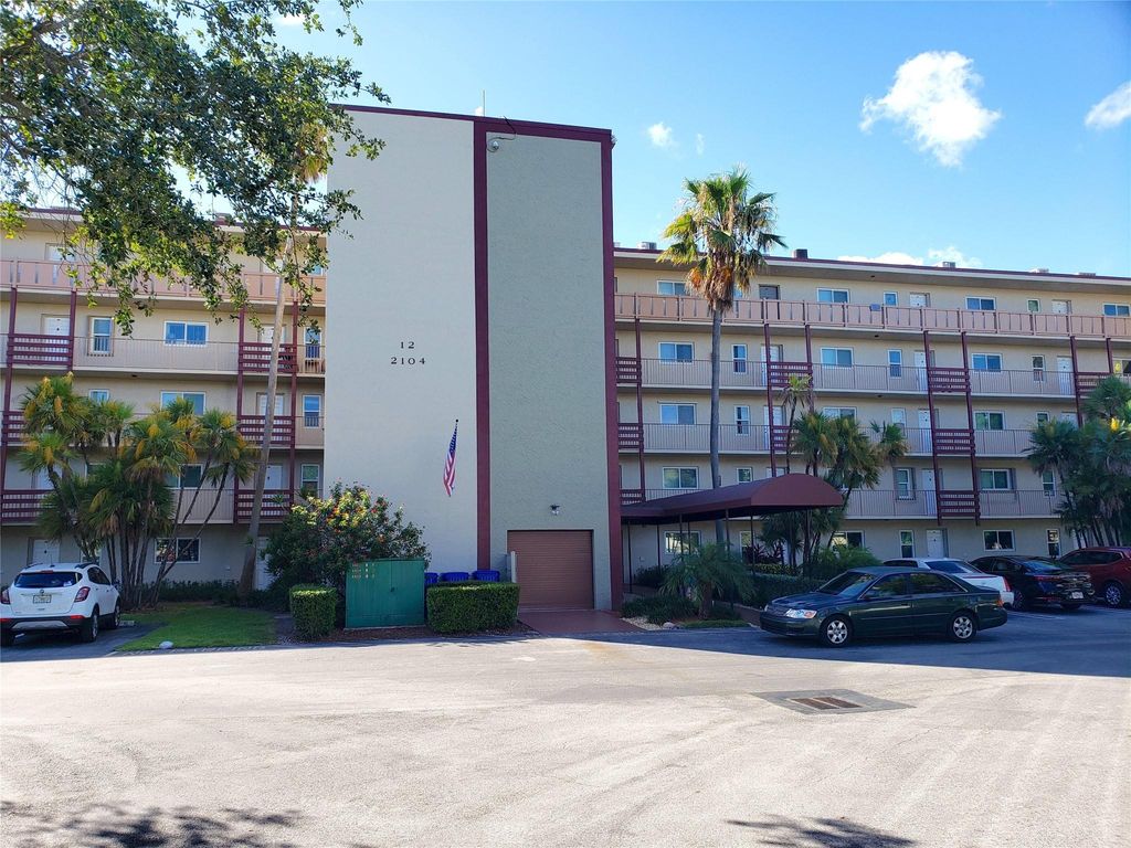 Photo of 2104 S Cypress Bend Drive #408, Pompano Beach, FL 33069 (MLS # F10449613)