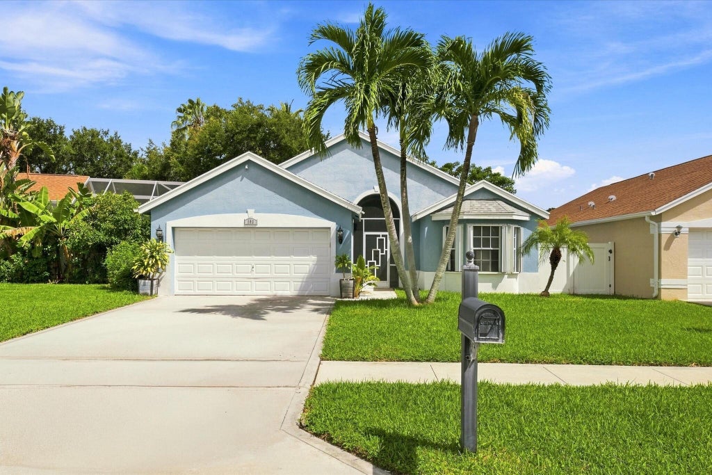 Photo of 103 Saddle Trail, Royal Palm Beach, FL 33411 (MLS # B26072295)