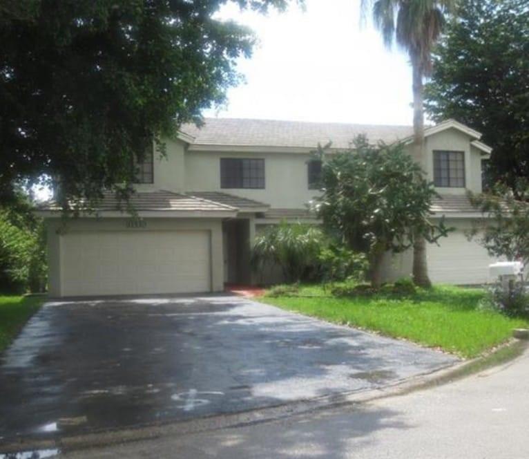 COMPLETELY REMODELED DUPLEX!! MUST SEE!! Huge 3 bedroom 2 1/2 bath. Two floors with huge 25 ft ceilings! 2 car garage. Walk in closets. All NEW stainless steel appliances including brand new washer and dryer in laundry room. Freshly painted interior and exterior with new kitchen with granite countertops, Huge stainless steel sink! Great location down the block from the new Costco, as well as close to the Coral Springs sports complex. Right next do the New Downtown Coral Springs with all the new development! Less then 5 minute drive to the sawgrass expressway, and easy access to major highways. Great schools and shopping near by.