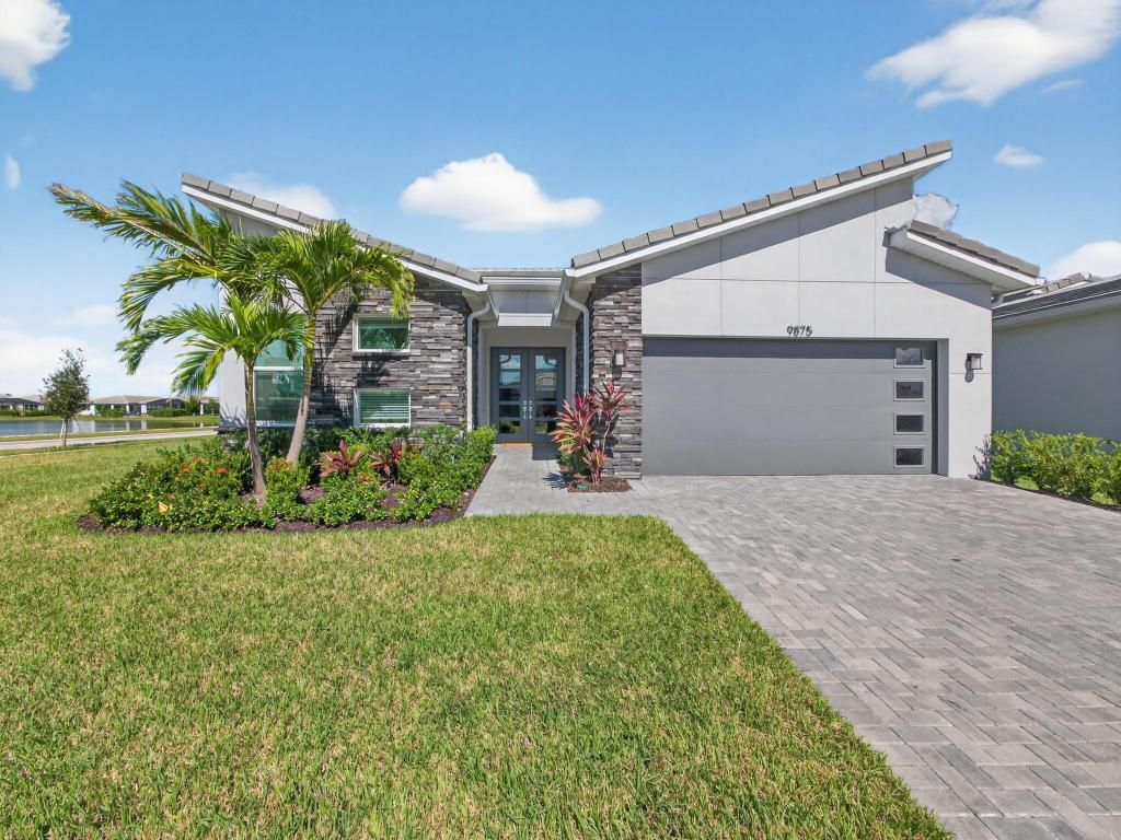 Photo of 9875 SW Veronese Drive, Port Saint Lucie, FL 34987 (MLS # R11132667)