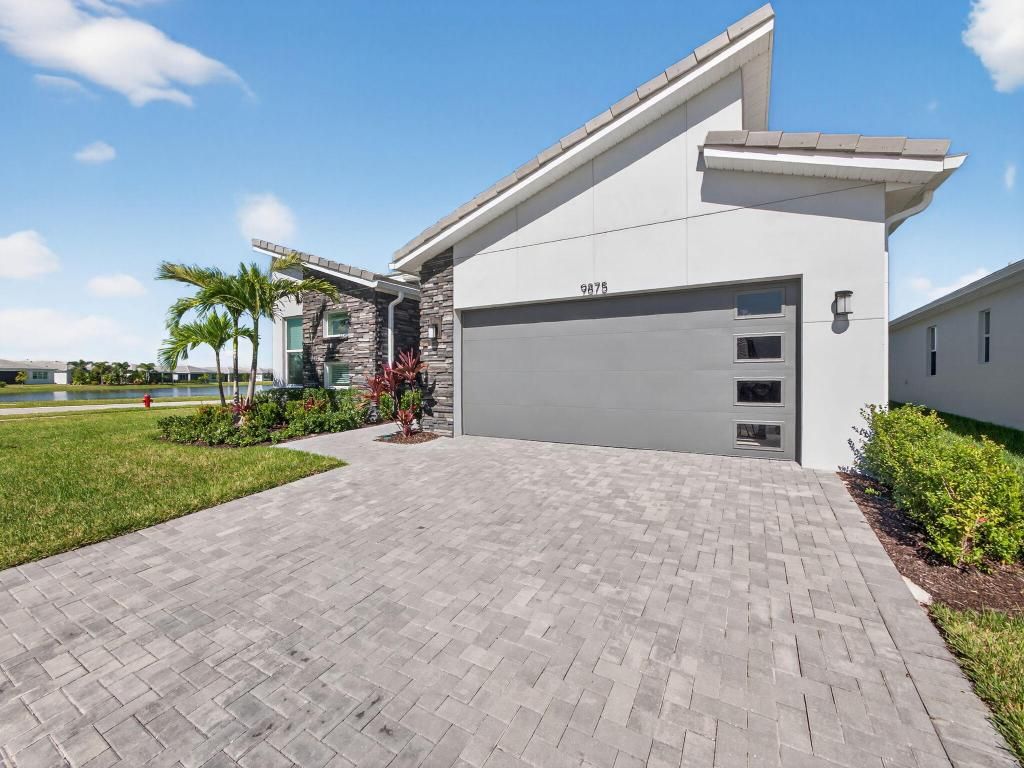 Photo of 9875 SW Veronese Drive, Port Saint Lucie, FL 34987 (MLS # R11132667)