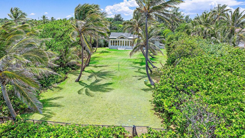 Photo of 5 N Beach Road, Jupiter Island, FL 33455 (MLS # R11094697)