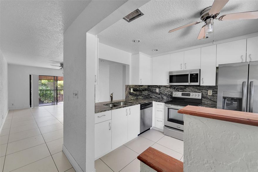 Step into this beautiful 2 bed, 2 bath condo featuring an open floor plan perfect for entertaining. The updated kitchen boasts modern finishes and plenty of counter space, flowing seamlessly into the dining and living areas. Enjoy your morning coffee on the private patio, which includes a convenient extra storage closet. The spacious primary bedroom offers a generous walk-in closet and a well-appointed en-suite bathroom. 2nd Floor Unit. No Carpet. No elevator. Tiled Living & Kitchen Areas and wood laminate in spacious bedroom. Ideal for year-round living, this home combines comfort and functionality in a welcoming community setting. Great Location Off University, near Shops, Schools, Restaurants, Worship. Credit/Background/Asso. Screening Rqrd. 1st/Last/SecDep. 1 Pet Under 25lbs Ok.