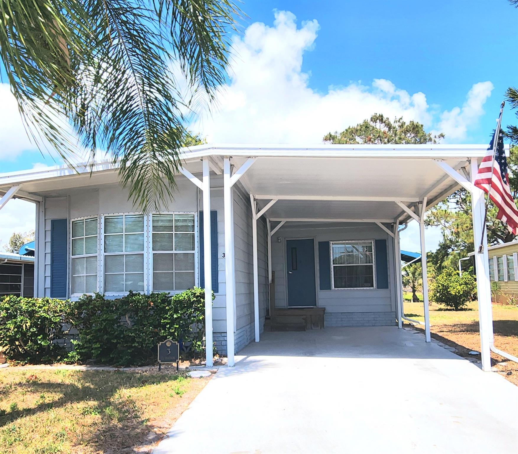 Welcome to your 55+ lakeside retreat! Bright, charming home offers stunning lake views. Enjoy fishing or watching birds & ducks glide by. ROOF SEALED & Exterior PAINTED in 2024, AC 2019, Water Htr 2014. Beauty continues inside w/ sturdy floors. Kitchen boasts gently used appliances & adequate storage. Florida Room w/ AC serves as an additional living room, cafe, office & more! GREAT location in PSL & the community itself in a highly sought area! Tranquil & close to all amenities! Don't miss this opportunity to own a slice of paradise! Lot rent of 943.57 includes private golf course (no fees to play) pool, pickleball, tennis, shuffleboard, bocce, gym, library, card games, MahJong, Bible study, wood workshop, parades, dinners, dances, trips & more! Lawn cutting & trash included