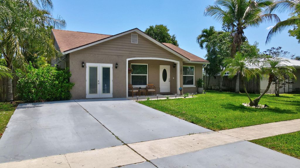 Photo of 1392 Thornridge Lane, Royal Palm Beach, FL 33411 (MLS # B26021707)
