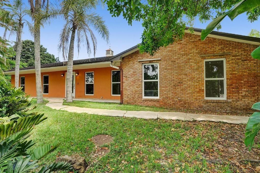 Photo of 14301 SW 29th Ct, Davie, FL 33330 (MLS # F10335886)