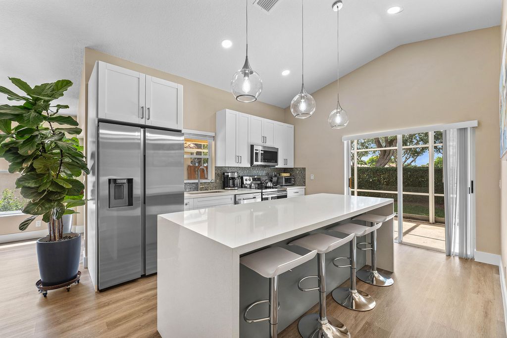 Photo of 7398 Granville Avenue, Boynton Beach, FL 33437 (MLS # B26032834)