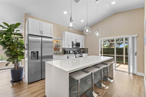 Photo of 7398 Granville Avenue, Boynton Beach, FL 33437 (MLS # B26032834)