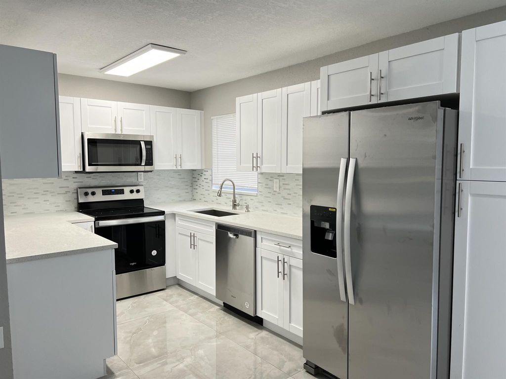 Photo of 4696 Collier Road, Lake Worth, FL 33463 (MLS # R11115847)